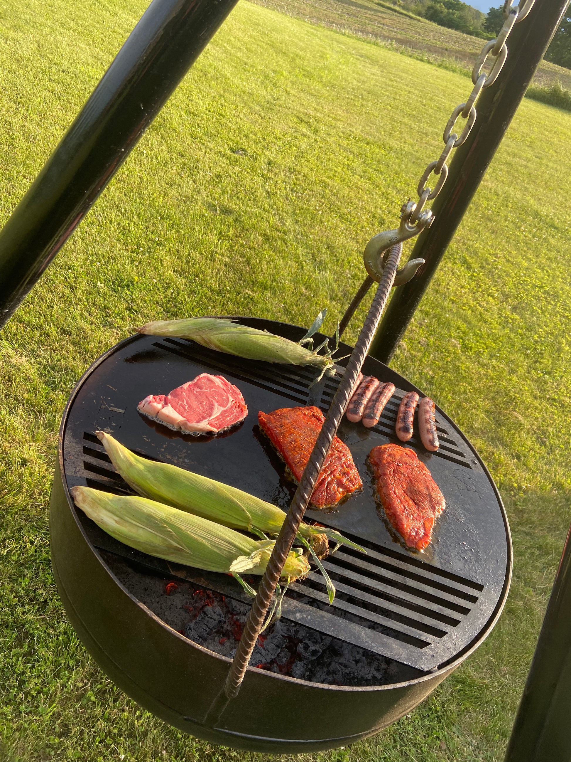 The Fyre Bowl grilling corn, steak and sausage| Northern Fyre